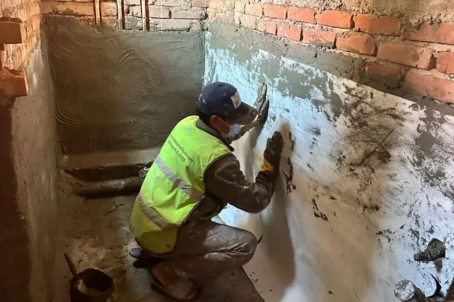 on an interior wall for leakage protection